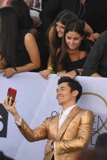 January 27, 2019 - Los Angeles, California, U.S - HENRY GOLDING WITH FANS during silver carpet arrivals for the 25th Annual Screen Actors Guild Awards, held at The Shrine Expo Hall. Los Angeles U.S. - ZUMAz03_ 20190127_zbp_z03_331 Copyright: xKevinxSullivanx