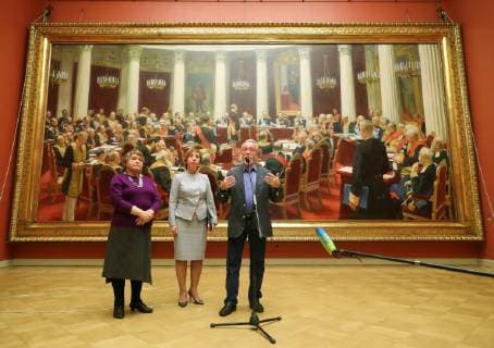 ST PETERSBURG, RUSSIA - FEBRUARY 11, 2019: Russian Museum Director Vladimir Gusev (R) talks to journalists at Mikhailovsky Castle (St Michael s Castle) about the plans to lend a painting by Ilya Repin, Ceremonial meeting of the State Council of 7 May 1901 on the day of the Centenary of its Establishment (behind), to Moscow s Tretyakov Gallery for an exhibition marking Ilya Repin s 175th birthday anniversary. Peter Kovalev TASS  TS0A08EF