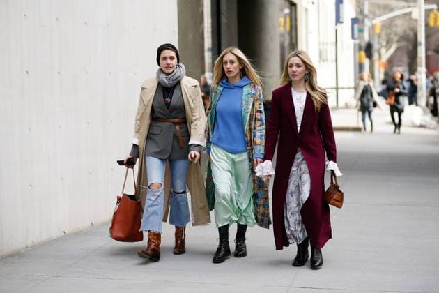 Chic showgoers posing on the street before the Tibi show during New York Fashion Week - Feb 10, 2019 - NYFW: Fall 2019 Street Style Day 4, New York New York United States  Copyright: xMichaelxIpx h_00580700