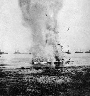 Stereoview WW1 Realistic Travels Military photographs circa 1918. A trapped German submarine driven inshore and blown clean out of the water DesignxPicsx xJohnxShort 902_33_12539576HighRes