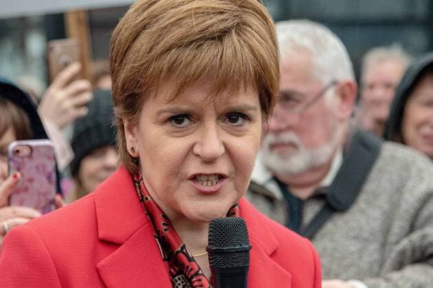 February 23, 2019 - Govan, Glasgow City, United Kingdom - Nicola Sturgeon, First Minister of Scotland is seen giving a speech to the crowd during the demonstration..Protesters from all over Scotland took part in a protest against the changes in the state pension for women. WASPI (Women Against State Pension Injustice) and several other groups took to the streets in protest over it. Govan United Kingdom - ZUMAs197 20190223_zaa_s197_230 Copyright: xStewartxKirbyx