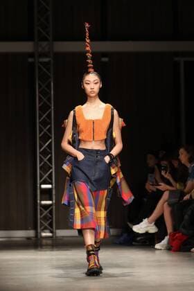 (190224) -- MILAN, Feb. 24, 2019 (Xinhua) -- A model presents a creation for Angel Chen during Milan Fashion Week Autumn Winter 2019-20 in Milan, Italy, Feb. 24, 2019. (Xinhua Cheng Tingting) ITALY-MILAN-FASHION WEEK-ANGEL CHEN 