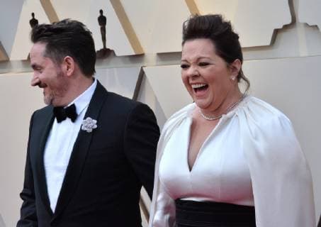 Ben Falcone and Melissa McCarthy arrive on the red carpet for the 91st annual Academy Awards at the Dolby Theatre in the Hollywood section of Los Angeles on February 24, 2019.  LAP20190224125 JIMxRUYMEN
