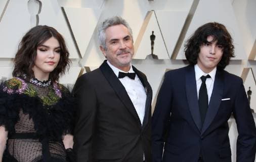 Mexican director Alfonso Cuaron (C) and his children Olmo Teodoro (R) and Tess Bu (L) arrive at the red carpet of the 91th Academy Awards, in Hollywood, California, United States, 24 February 2019. 91st Academy Awards in Hollywood !ACHTUNG: NUR REDAKTIONELLE NUTZUNG!  Copyright: xEMILIOxFLORESx AME9043 20190225-636866576944025324