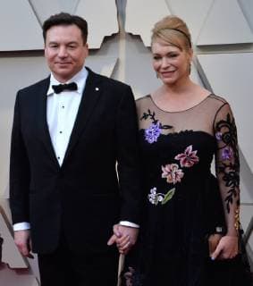 Mike Myers (L) and Kelly Tisdale arrive on the red carpet for the 91st annual Academy Awards at the Dolby Theatre in the Hollywood section of Los Angeles on February 24, 2019.  LAP20190224225 JIMxRUYMEN
