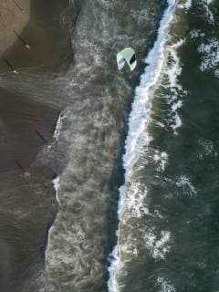 Indonesia, Bali, Berawa beach, Aerial view of kite surfer  KNTF02545