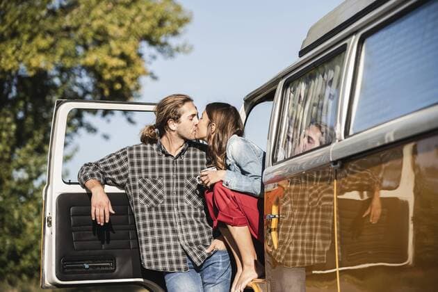 Affectionate couple doing a road trip in their camper model released Symbolfoto  UUF16146