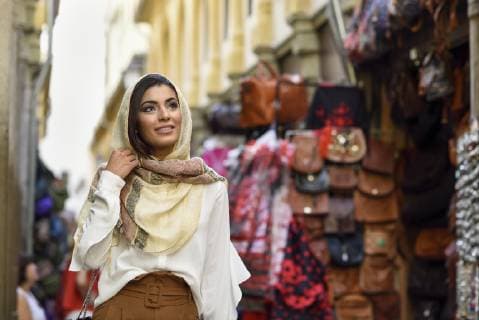 Spain, Granada, young muslim tourist woman wearing hijab during sightseeing in the city model released Symbolfoto  JSMF00559