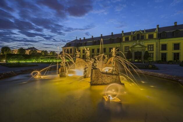 Germany, Lower Saxony, Hanover, Herrenhaeuser Gaerten, Neptun Fountain and Galery, Orangenparterre in the evening property released  PVCF01175