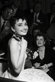 Audrey Hepburn wearing a white floral dress by Hubert de Givenchy at the 26th Annual Academy Awards held at the NBC Century Theatre in New York City on March 25, 1954. Hepburn won best actress for Roman Holiday File Reference 33751_478THA Hollywood CA USA  Copyright: xCinemaxLegacyxCollection ThexHollywoodxArchivex 33751_478THA