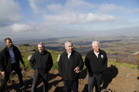 Israeli Prime minister Bejamin Netanyahu, Republican U.S. Senator Lindsey Graham and U.S. Ambassador to Israel David Friedman visit the border line between Israel and Syria at the Israeli-occupied Golan Heights March 11, 2019.  WAX20190311904 RONENxZVULUN