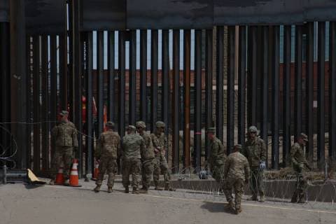 Mexico: Army of USA arrived at the border between Juarez and El Paso Soldiers from the United States, arrived at the border between Juarez and El Paso, Texas, United States, to take care of the frontier border, of the migrants, installed barbed wire near the wall that divides both countries Juarez Chihuahua Mexico  DavidxPeinado