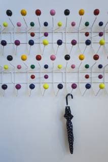 Designklassiker von Ray und Charles Eames Germany, Baden-Wurttemburg, Weil am Rhein, Vitra Architectural Design Campus, Vitra Haus, designed by Herzog and de Meuron, 2010, Eames Hang it All Coat Rack  Copyright: xWalterxBibikowx EU10 WBI2088