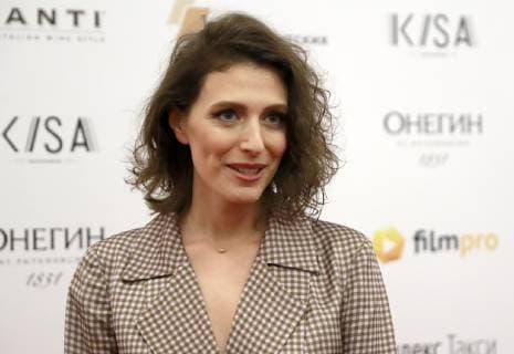 MOSCOW, RUSSIA - APRIL 14, 2019: Film director Natalya Merkulova arrives for the 2nd East â€“ West: Golden Arch award ceremony at Et Cetera Theatre; East â€“ West. Golden Arch is an international prize awarded to films made in Eastern Europe and Western Asia. Sergei Fadeichev TASS  TS0A82FC