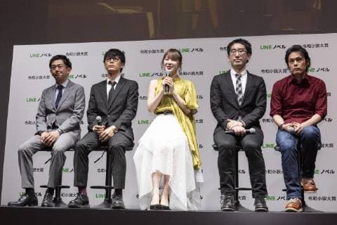 April 16, 2019 - Tokyo, Japan - (L to R) Hiroshi Mori Executive Officer of LINE Corp., Yuma Takahashi producer of Aniplex, Japanese idol Kazumi Takayama, Hiroyuki Ueno Producer of Nippon Television Network Corp. and Kazuma Miki CEO of Straight Edge Inc., speak during a news conference to announce a new service Line Novel and the Reiwa Novel Award which aims users to participate on its first novel contest sending their creations through their app from April 16 to September 30. Tokyo Japan - ZUMAm191 20190416_zap_m191_035 Copyright: xRodrigoxReyesxMarinx