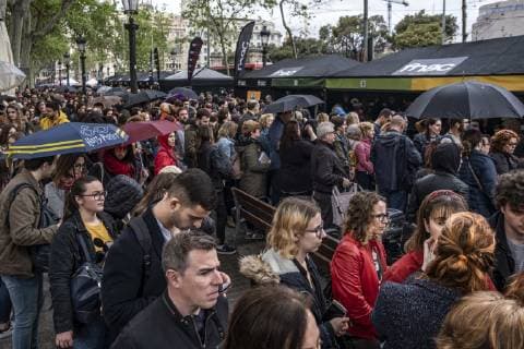 April 23, 2019 - Barcelona, Catalonia, Spain - A crowd of people are seen waiting to get the signature of their favourite writers at the stalls of the FNAC during the Sant Jordi day celebration..The festivity of Sant Jordi is celebrated in conjunction with Book Day and the Fair of Roses, symbols of culture and love. Knight Saint Jordi died on April 23, 303.The cult of Saint Jordi was established in Catalonia during the 8th century but it is at the end of the 19th century, with the Catalan Renaixenca that installed as the most celebrated patriotic, civic and cultural day in Catalonia. The streets of the cities and towns of Catalunya are filled with stalls with books and roses for sale. Tradition orders that man should give a rose to his partner and the woman a book in turn. Barcelona Spain - ZUMAs197 20190423_zaa_s197_080 Copyright: xPacoxFreirex