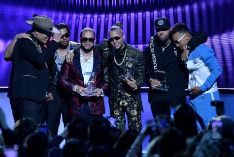 (L-R) Darell, Bad Bunny, Casper Magico, Nio Garcia, Nicky Jam and Ozuna accept their awards onstage during the 26th annual Billboard Latin Music Awards at the Mandalay Bay Events Center in Las Vegas, Nevada on April 25, 2019.  LAV20190425623 JIMxRUYMEN