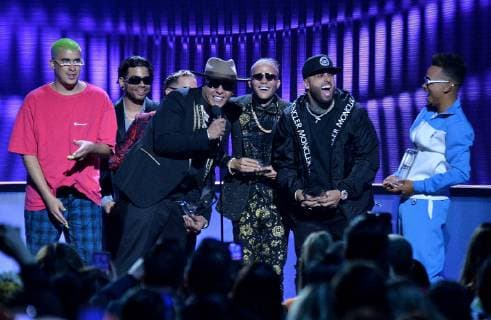 (L-R) Bad Bunny, Casper Magico, Darell, Nio Garcia, Nicky Jam and Ozuna accept their awards onstage during the 26th annual Billboard Latin Music Awards at the Mandalay Bay Events Center in Las Vegas, Nevada on April 25, 2019.  LAV20190425628 JIMxRUYMEN