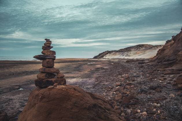 Germany, Sylt, Schleswig Holstein Wadden Sea National Park, Morsum Kliff, dune landscape,cairn, evening light  ANHF00080