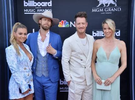 (L-R) Brittney Marie Cole Kelley, Brian Kelley and Tyler Hubbard of Florida Georgia Line, and Hayley Stommel Hubbard arrive for the 2019 Billboard Music Awards at the MGM Grand Garden Arena in Las Vegas, Nevada on May 1, 2019.  LAV20190501168 JIMxRUYMEN
