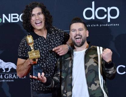 (L-R) Dan Smyers and Shay Mooney of Dan + Shay appear backstage after winning the award for Top Country Duo Group during the 2019 Billboard Music Awards at the MGM Grand Garden Arena in Las Vegas, Nevada on May 1, 2019.  LAV20190501179 JIMxRUYMEN