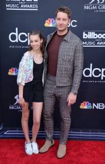 (L-R) Isabella Justice Hartley and Justin Hartley arrive for the 2019 Billboard Music Awards at the MGM Grand Garden Arena in Las Vegas, Nevada on May 1, 2019.  LAV20190501326 JIMxRUYMEN