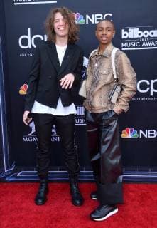 Lucas Jagger (L) and guest arrive for the 2019 Billboard Music Awards at the MGM Grand Garden Arena in Las Vegas, Nevada on May 1, 2019.  LAV20190501413 JIMxRUYMEN