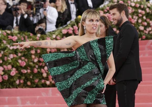Miley Cyrus and Liam Hemsworth arrive on the red carpet at The Metropolitan Museum of Art s Costume Institute Benefit Camp: Notes on Fashion at Metropolitan Museum of Art in New York City on May 6, 2019.  NYP2019050933 JOHNxANGELILLO