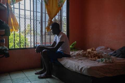Stephen sits in his motel room who he shares with 2 other men to keep the cost down in Tapachula, Mexico on May 8, 2019. Stephen traveled from his home country, Cameroon to Mexico in hopes of getting an exit visa so he can travel to the US-Mexico border and seek asylum.  TP2019050809 ARIANAxDREHSLER