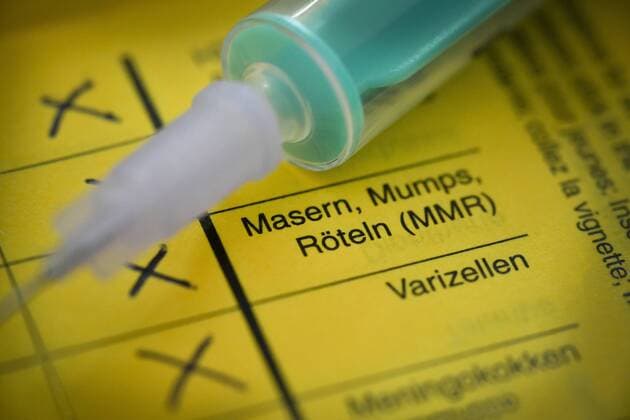 Masern, Impfbuch, Symbolfoto Impfung