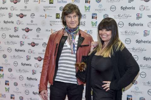 Turin. Arriving at the Hoas Eleventy fashion show event in the photo: Ronn Moss with Devin DeVasquez  Copyright: xRiccardoxGiordanox xIPAx xFotosickix