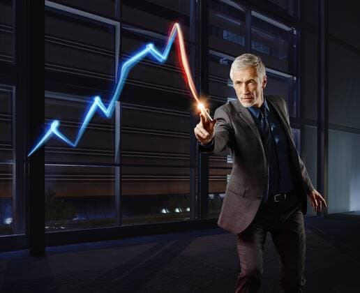 Businessman painting the stock market development with light model released Symbolfoto property released  RORF01789