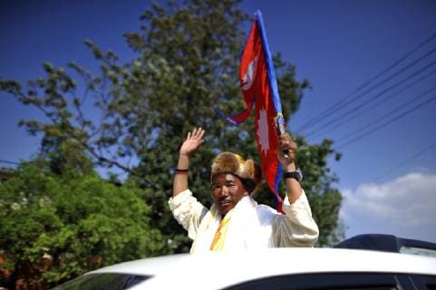 May 25, 2019 - Kathmandu, NP, Nepal - 49yrs old Nepali mountaineer Kami Rita Sherpa, who broke his own world record for the most Everest summits, wave hand towards relatives and media after arrives in Tribhuvan International Airport in Kathmandu, Nepal on Saturday, May 25, 2019. Kami Rita Sherpa broke his own world record for the most Everest summits on 21st May, 2019 by reaching the world s highest peak for the 24th time via S Col- SE Ridge. Kathmandu Nepal  - ZUMAn230 20190525_zaa_n230_205 Copyright: xNarayanxMaharjanx