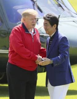 Trump in Japan U.S. President Donald Trump (L) is greeted by Japanese Prime Minister Shinzo Abe at Mobara Country Club in Chiba Prefecture on May 26, 2019, upon Trump s arrival aboard the Marine One helicopter. Abe and Trump were scheduled to play golf at the course near Tokyo -- their fifth round together since the U.S. leader took office in 2017. (Pool photo) 
