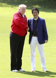 Trump in Japan U.S. President Donald Trump (L) and Japanese Prime Minister Shinzo Abe shake hands after Trump s arrival at Mobara Country Club in Chiba Prefecture, near Tokyo, on May 26, 2019. The two leaders played their fifth round of golf together since Trump took office in 2017. (Pool photo) 
