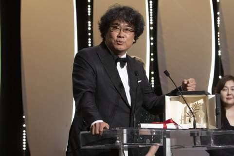 Bong Joon-ho with his Palme d Or (Golden Palm) for the movie Parasite Gisaengchung at the award ceremony during the 72nd Cannes Film Festival at the Palais des Festivals on May 25, 2019 in Cannes, France