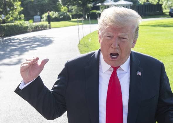 President Donald Trump reacts to a reporter s question during a press conference prior to departing via Marine One on the South Lawn of the White House in Washington, DC on May 30, 2019. The president gave his interpretations the remarks by Robert Mueller on the probe into Russian interference in the 2016 election. He will be in Colorado for the day.  WAS2019053005 PATxBENIC
