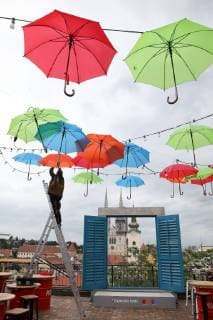 Coloured umbrellas at festival - Zagreb, Croatia 30.05.2019., Zagreb, Croatia - Hanging coroured umbrellas as a part of preparation for Bas Nas gourmet & music festival at upper town in Zagreb  PatrikxMacek PIXSELL