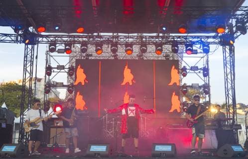 Cannes, France - June 04, 2019: MIDEM, the International B2B Music Market. MIDEM by Night Beach Concert with Neon Garden, Panda Glasses and Qing Mu MIDEM, the International B2B Music Market