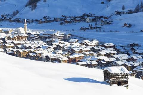 Village illuminated by sun after a snowfall, Livigno, Valtellina, Lombardy, Italy, Europe Copyright: FrancescoxBergamaschi 1269-463