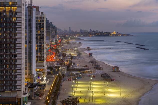 Elevated view of the beaches and hotels at dusk, Jaffa visible in the background, Tel Aviv, Israel, Middle East Copyright: FrankxFell 844-19299