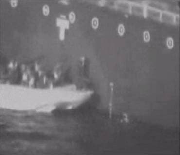 In a video released by the United States on June 14, 2019, an Islamic Revolutionary Guard Corps (IRGC) Gashti Class patrol boat is shown approaching the M T Kokuka Courageous oil tanker on June 13 and was observed and recorded removing an unexploded limpet mine from the hull of the ship. Screengrab via U.S. Central Command  WAX2019061401 USCENTCOM
