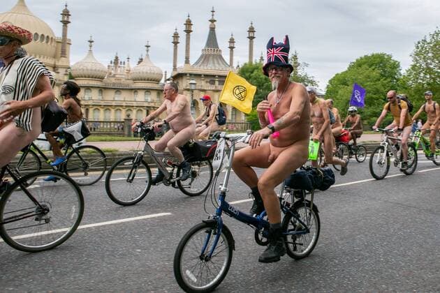 June 9, 2019 - Brighton, UK. 16 June 2019. Cyclists join the 2019 Brighton Naked Bike Ride to celebrate cycling and the human body and to draw attention to the climate crisis thanks to the participation of climate change group Extinction Rebellion. Since 2006, Brighton has joined World Naked Bike Rides in the UK and worldwide to highlight the vulnerability of cyclists on the road and campaign for better road safety and cleaner air, with now also demanding a more stable climate - ZUMAd99_ 20190609_zap_d99_001 Copyright: xMattxDuckettx