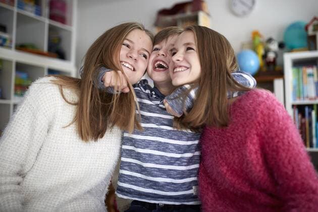 Siblings having fun together model released Symbolfoto property released  RBF07013