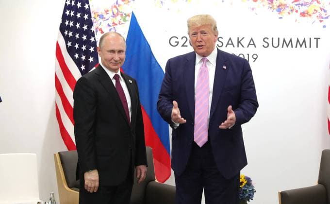 June 28, 2019. - Japan, Osaka. - Russian President Vladimir Putin and U.S. President Donald Trump (right) during a bilateral meeting at the Group of 20 (G20) leaders summit. KremlinxPool 