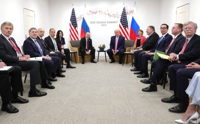 June 28, 2019. - Japan, Osaka. - Russian President Vladimir Putin and U.S. President Donald Trump (from L to R, center) during a bilateral meeting at the Group of 20 (G20) leaders summit. KremlinxPool 