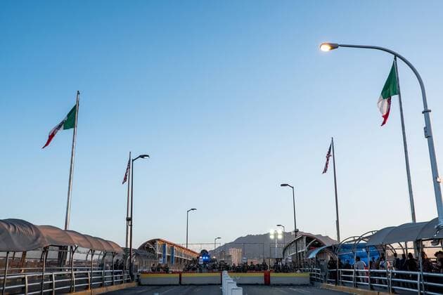 July 1, 2019 - Ciudad Juarez, Chihuahua, MEX - U.S. Customs and Border Protection and Border Patrol agents occupy the Paso del Norte Bridge as they block traffic from coming into the United States to El Paso, Texas, after protests in the early morning took place in Ciudad Juarez, Chihuahua, Mexico. Agents began letting pedestrians to cross by checking identification one person at a time once the protests subsided. Ciudad Juarez MEX - ZUMAj106 20190701_zap_j106_009 Copyright: xJoelxAngelxJuarezx