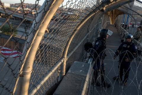 July 1, 2019 - Ciudad Juarez, Chihuahua, MEX - U.S. Customs and Border Protection and Border Patrol agents occupy the Paso del Norte Bridge as they block traffic from coming into the United States to El Paso, Texas, after protests in the early morning took place in Ciudad Juarez, Chihuahua, Mexico. Agents began letting pedestrians to cross by checking identification one person at a time once the protests subsided. Ciudad Juarez MEX - ZUMAj106 20190701_zap_j106_013 Copyright: xJoelxAngelxJuarezx