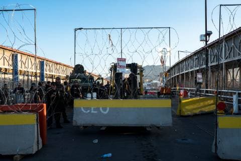 July 1, 2019 - Ciudad Juarez, Chihuahua, MEX - U.S. Customs and Border Protection and Border Patrol agents occupy the Paso del Norte Bridge as they block traffic from coming into the United States to El Paso, Texas, after protests in the early morning took place in Ciudad Juarez, Chihuahua, Mexico. Agents began letting pedestrians to cross by checking identification one person at a time once the protests subsided. Ciudad Juarez MEX - ZUMAj106 20190701_zap_j106_015 Copyright: xJoelxAngelxJuarezx