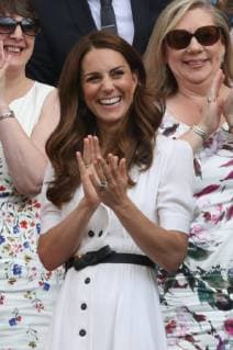 . 02 07 19 The Duchess of Cambridge applauds after Roger Federer wins his first round match on day two of the Wimbledon Tennis Championships in London.  xStephenxLockx xi-Imagesx IIM-19868-0073